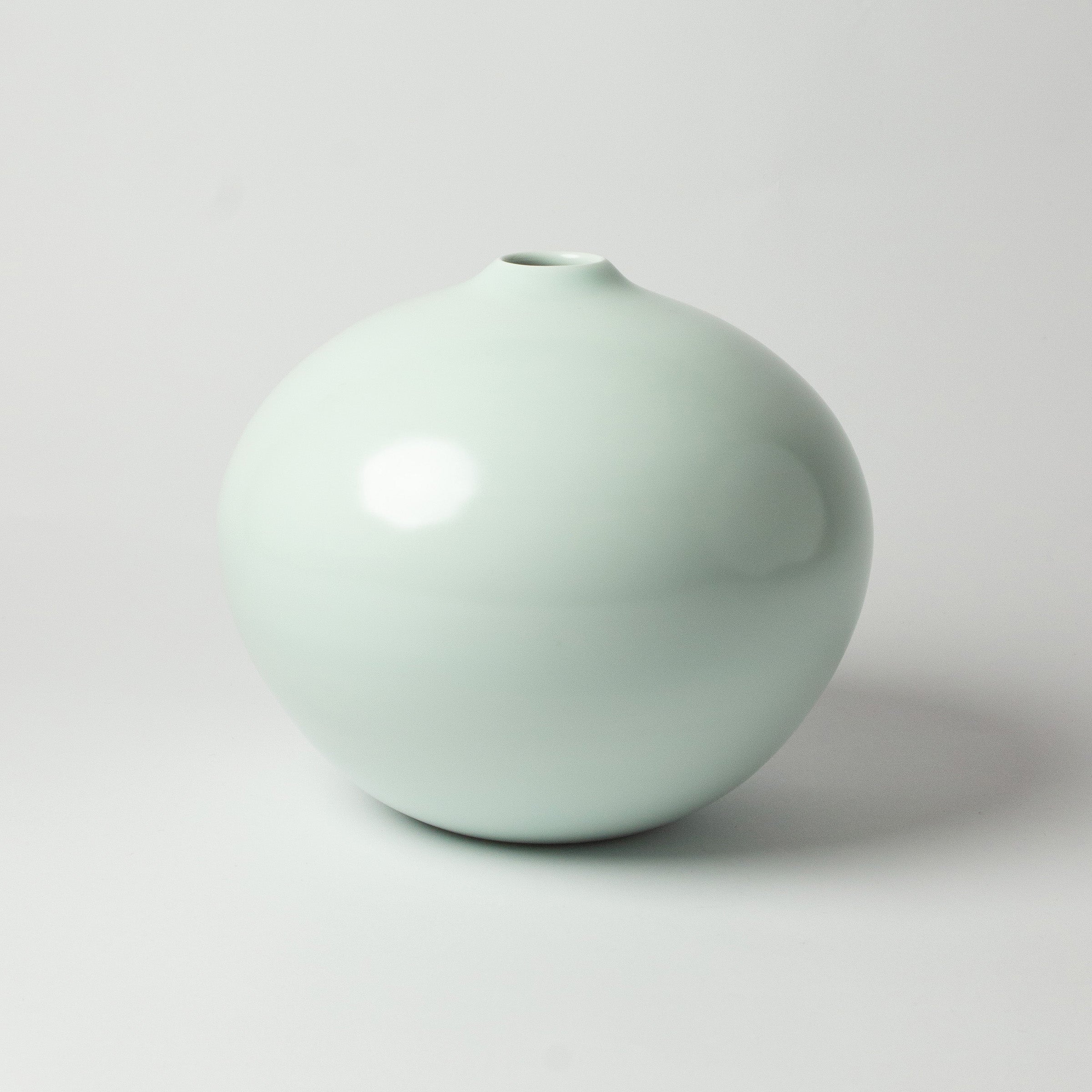 White celadon porcelain vase by Nishikawa Hiroshi