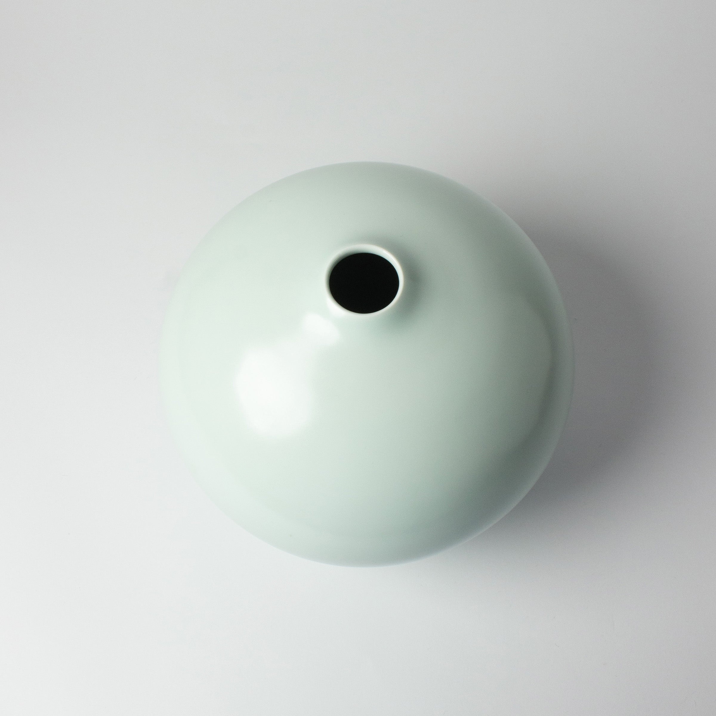 White celadon porcelain vase by Nishikawa Hiroshi