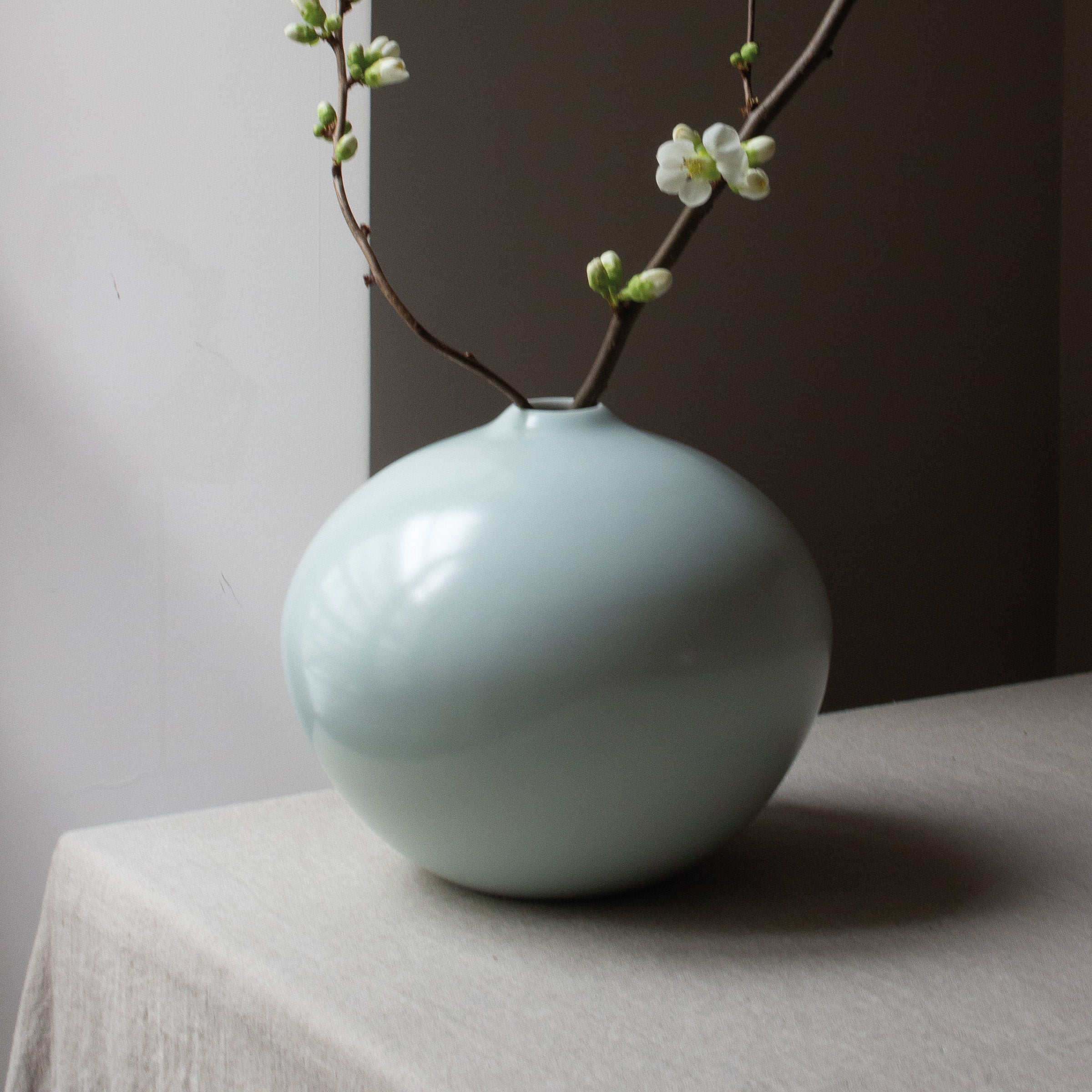 White celadon porcelain vase by Nishikawa Hiroshi