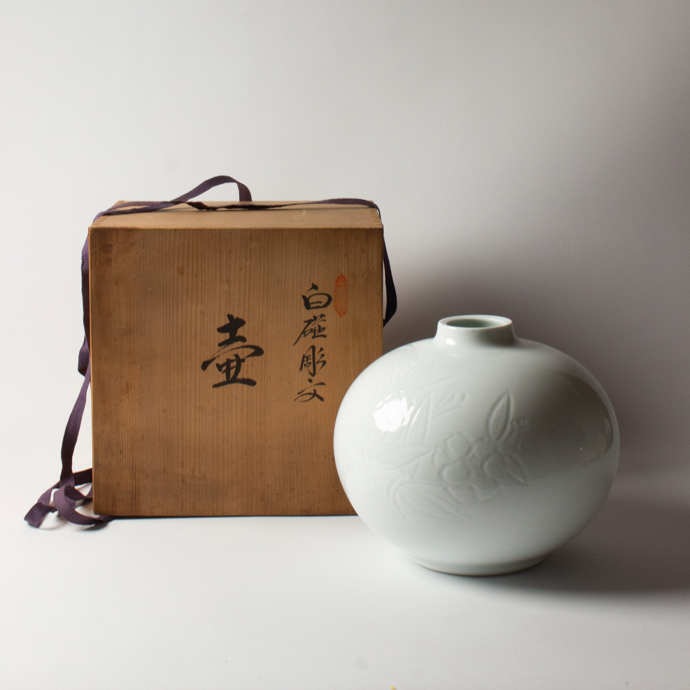 Porcelain vase and peonies by Manji Inoue