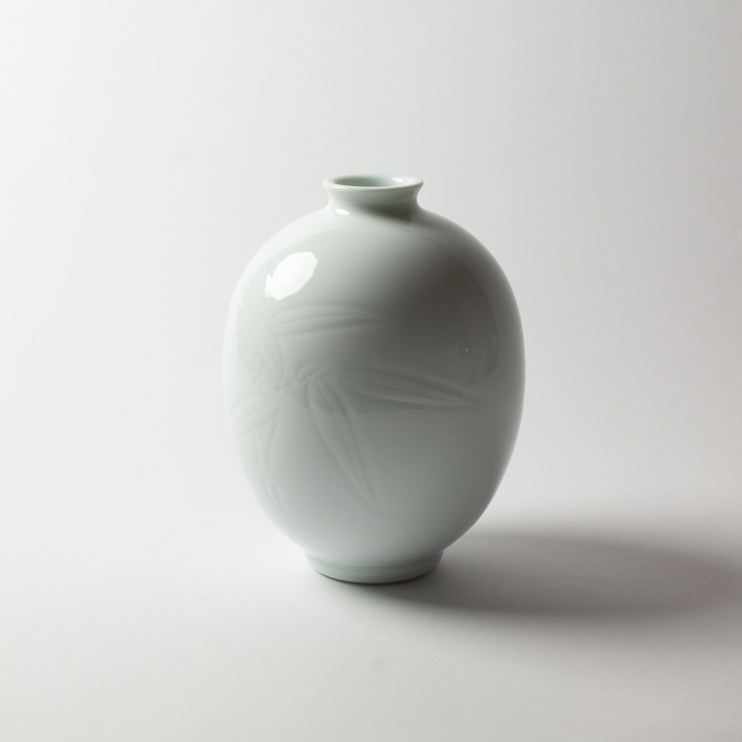 Vase porcelaine et bambou de Manji Inoue