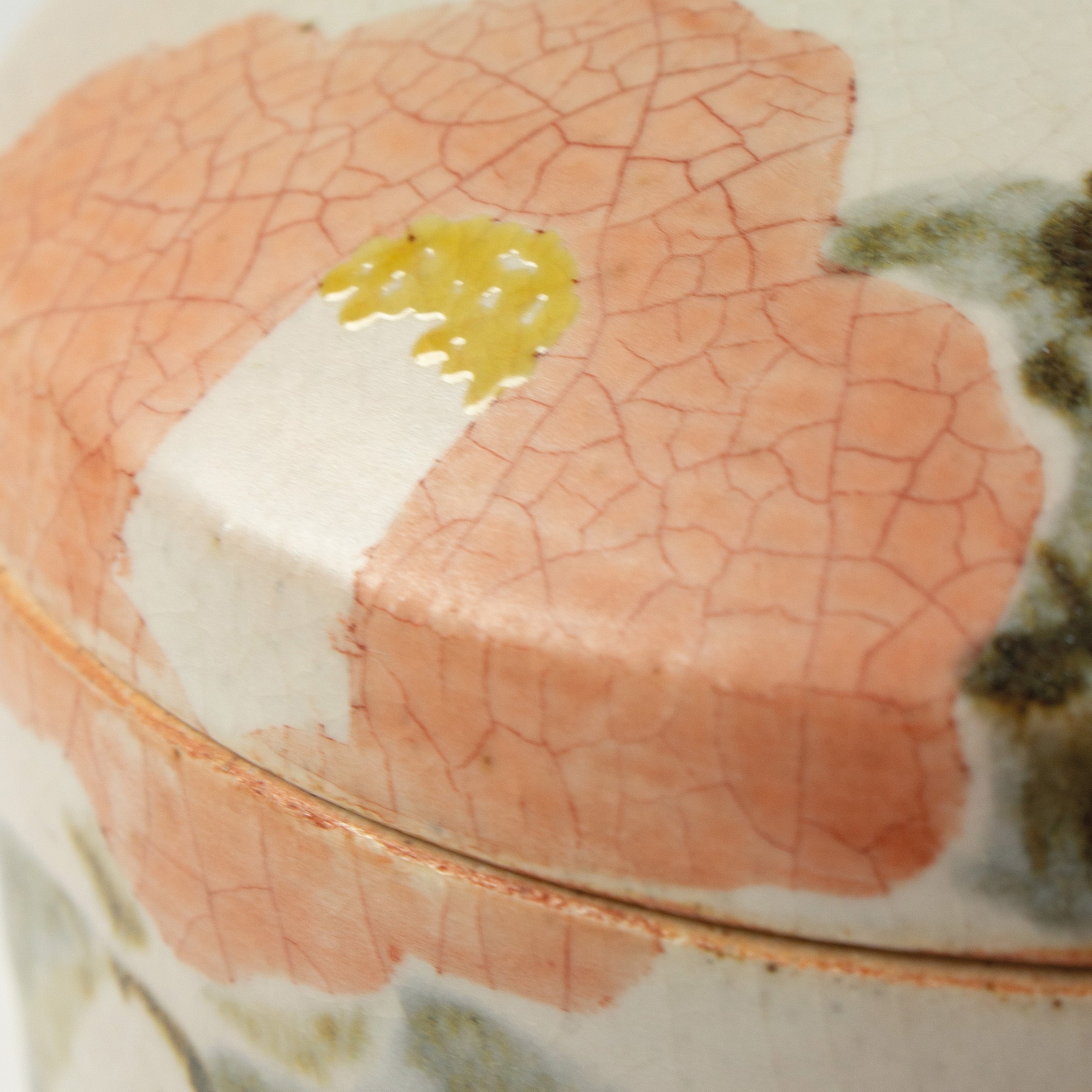 Japanese ceramic box with camellia motif by Seigō Maeda