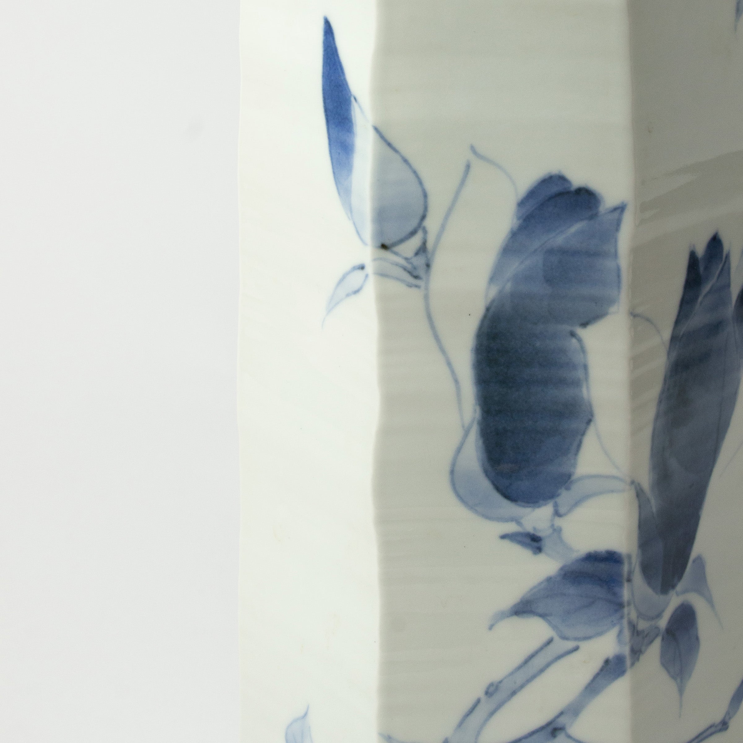 White porcelain vase with blue magnolias by Tetsuya Ueda