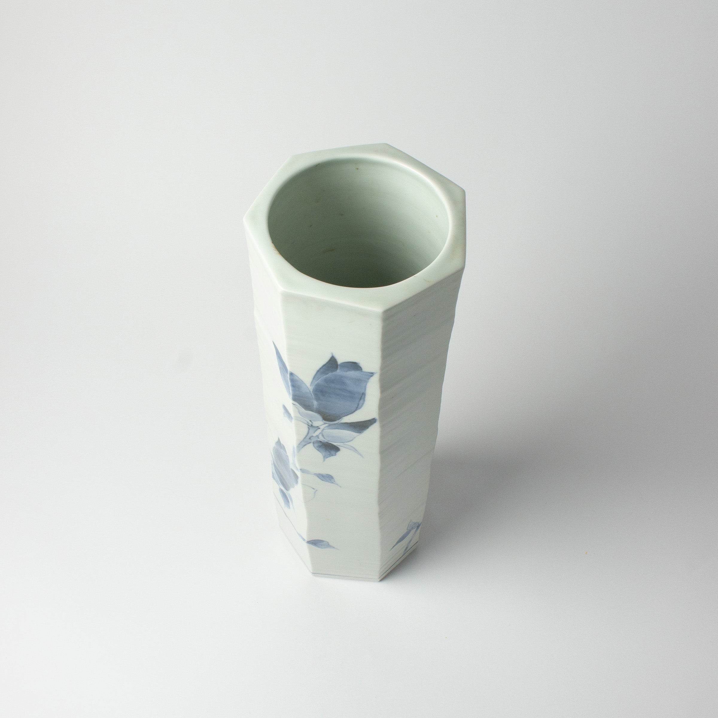 White porcelain vase with blue magnolias by Tetsuya Ueda