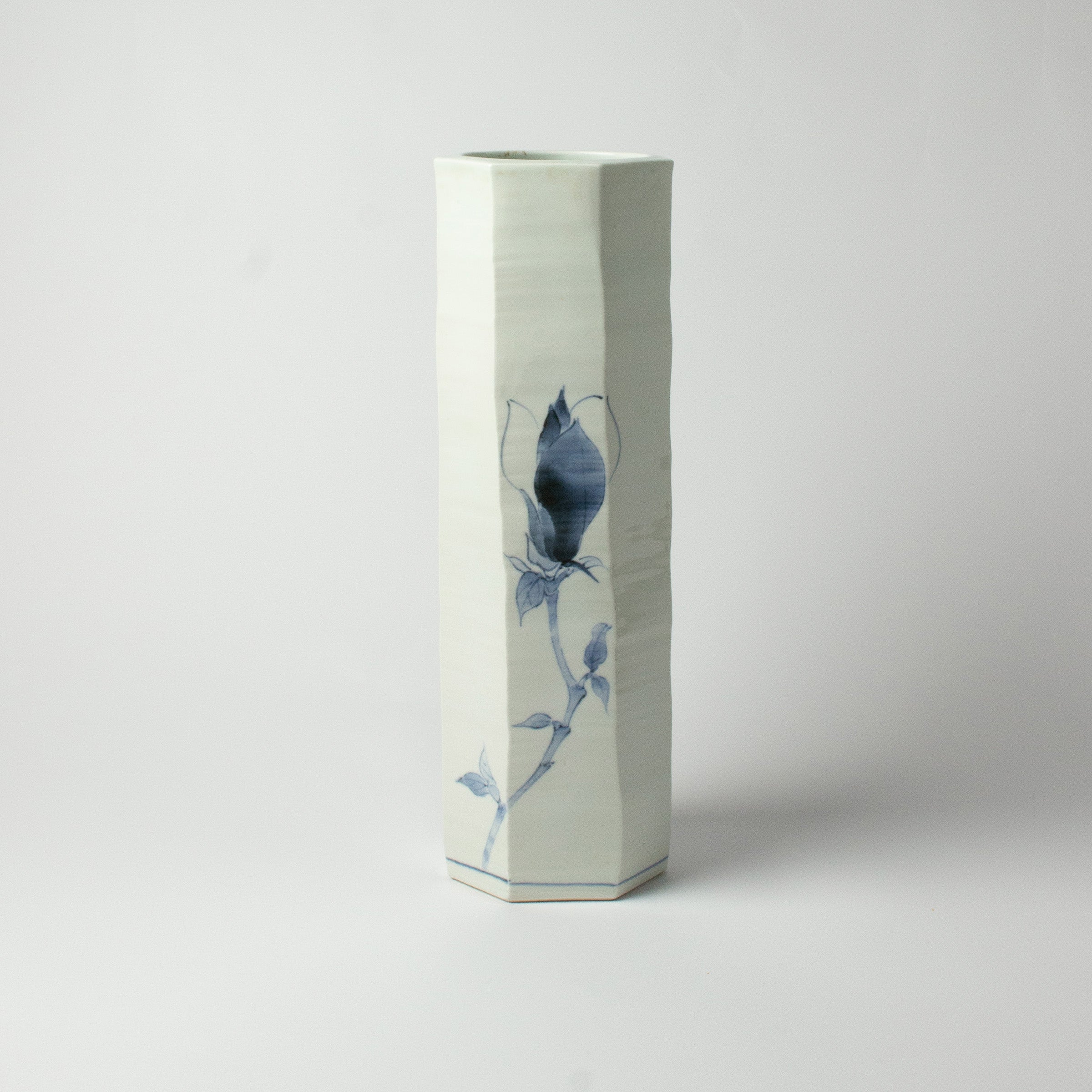 White porcelain vase with blue magnolias by Tetsuya Ueda