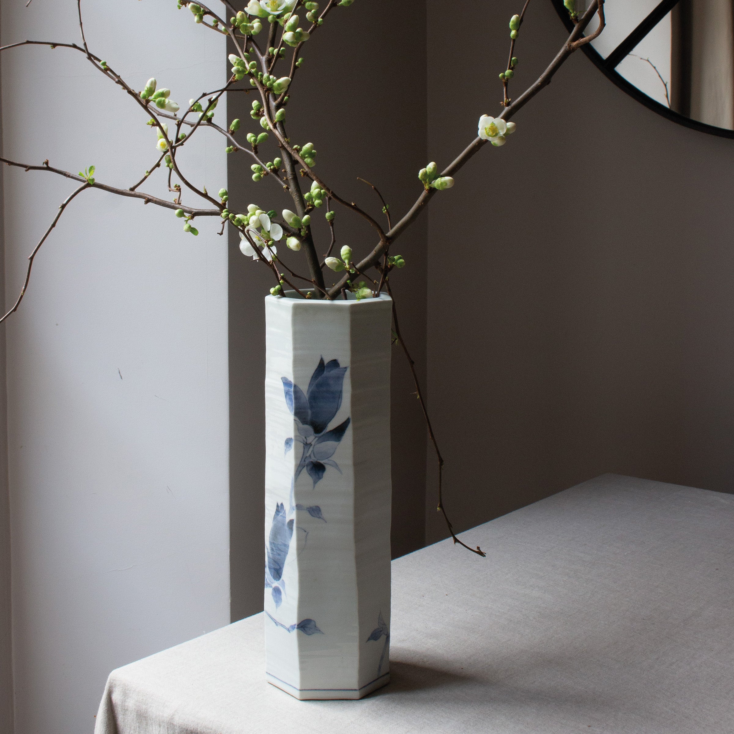 White porcelain vase with blue magnolias by Tetsuya Ueda