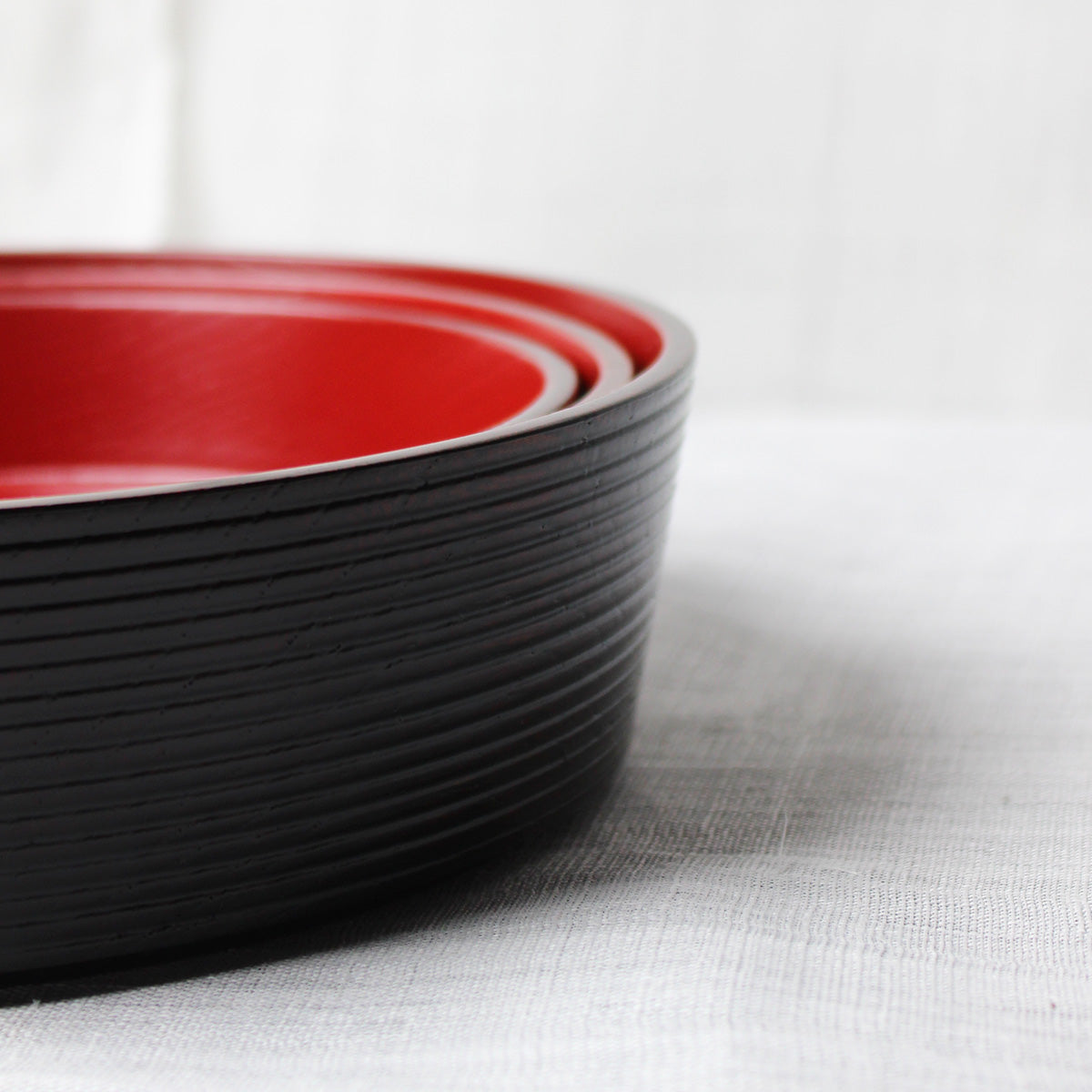 Set of 3 Japanese wooden plates, black and red urushi lacquer